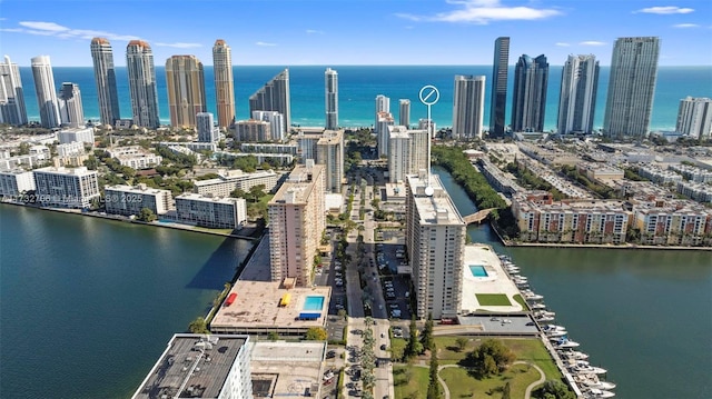 birds eye view of property featuring a water view