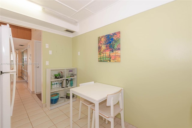 dining room featuring light tile patterned floors