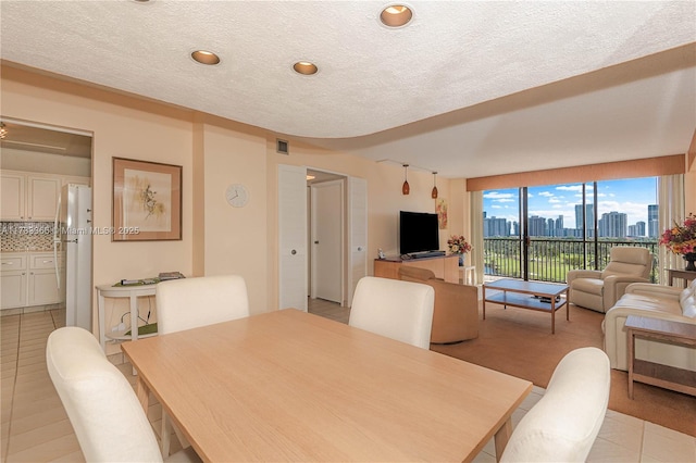 dining room with light tile patterned floors