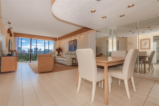 dining room with light tile patterned flooring