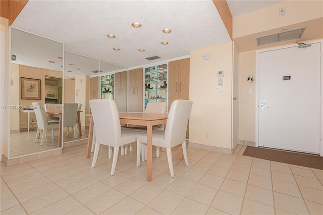 dining room with light tile patterned floors