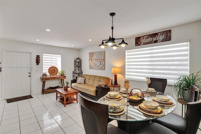 dining space with recessed lighting and light tile patterned flooring