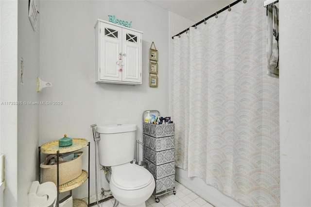 full bath with toilet, shower / bathtub combination with curtain, and tile patterned flooring