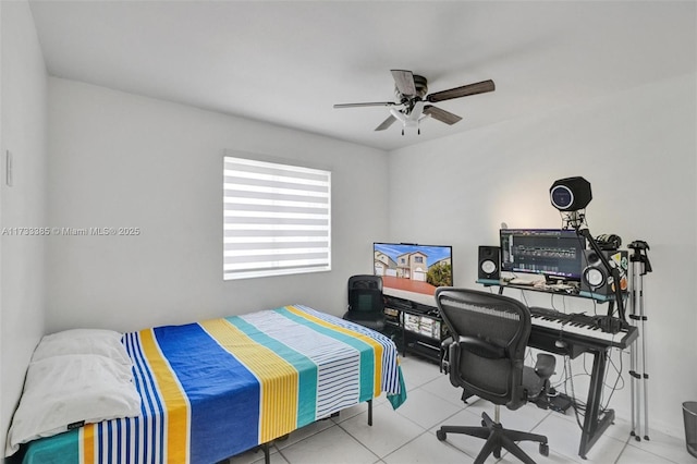 tiled bedroom with ceiling fan