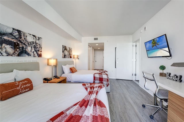 bedroom featuring hardwood / wood-style flooring