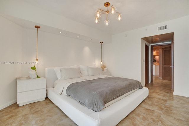 bedroom with a chandelier