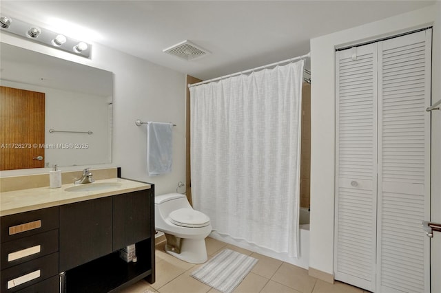 full bathroom featuring tile patterned flooring, vanity, shower / bath combination with curtain, and toilet