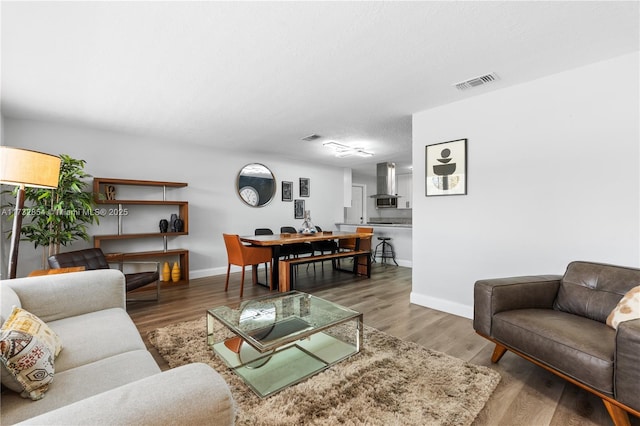 living room with hardwood / wood-style floors