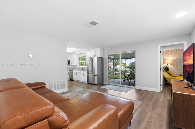 living room with hardwood / wood-style floors