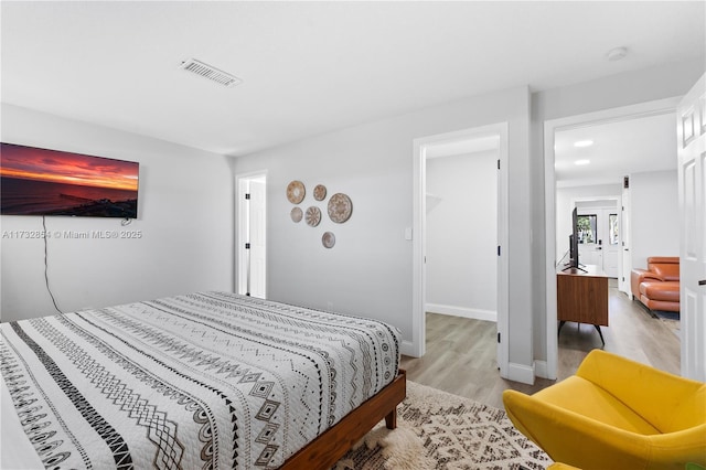 bedroom featuring light hardwood / wood-style floors