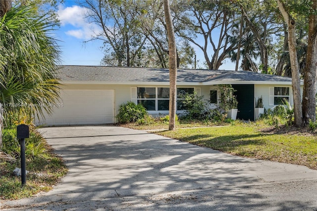 single story home with a garage