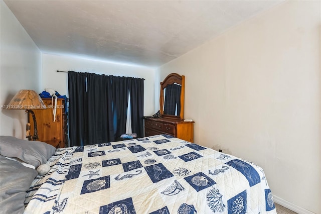 bedroom featuring carpet flooring