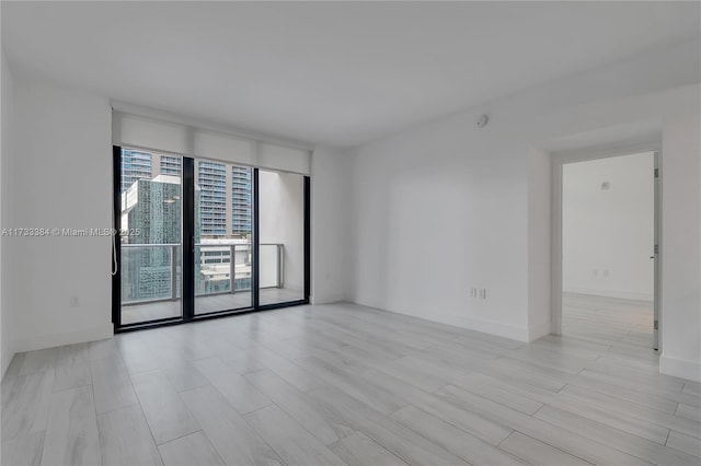 empty room with floor to ceiling windows