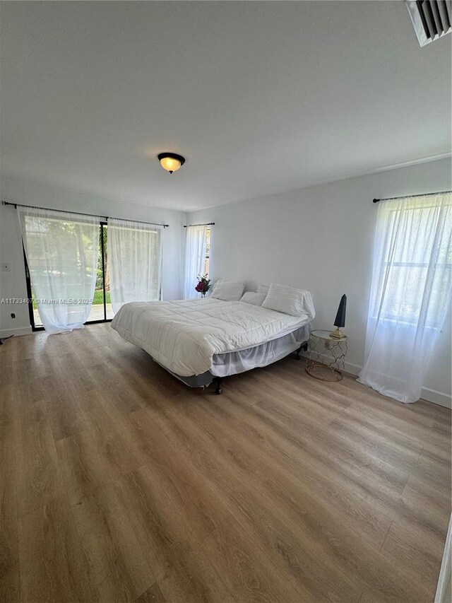 bedroom featuring light wood-type flooring