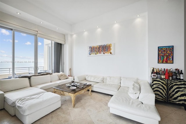 living room featuring a water view