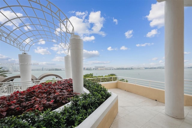 view of patio featuring a water view