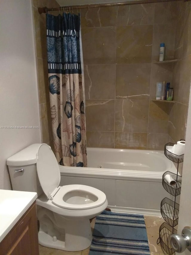 full bathroom with vanity, toilet, and shower / bath combo