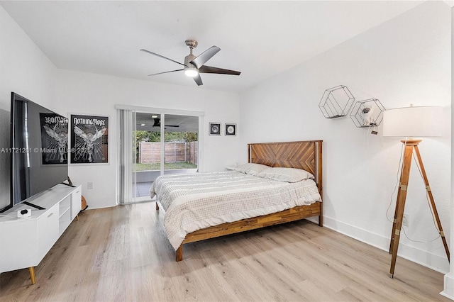 bedroom featuring ceiling fan, light wood-type flooring, and access to outside