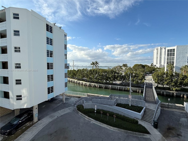 exterior space with a water view