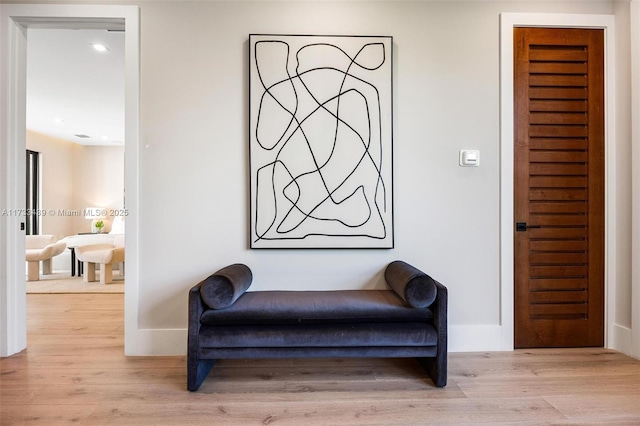 sitting room with light hardwood / wood-style flooring