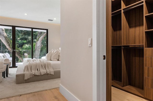 bedroom with light wood-type flooring