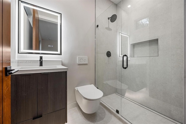 bathroom with tile patterned floors, vanity, toilet, and a shower with shower door