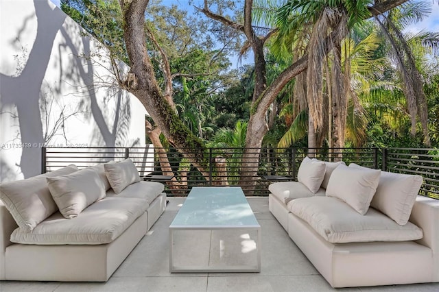 view of patio / terrace with an outdoor living space and a balcony