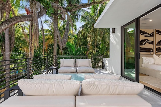 view of patio / terrace featuring a balcony and outdoor lounge area