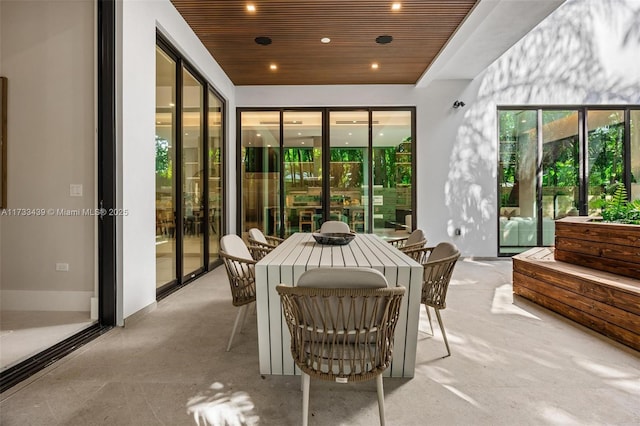 sunroom / solarium with wooden ceiling