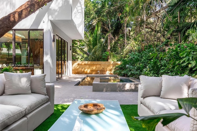 view of patio / terrace featuring an outdoor living space