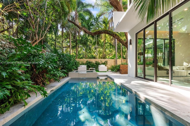 view of swimming pool with a patio