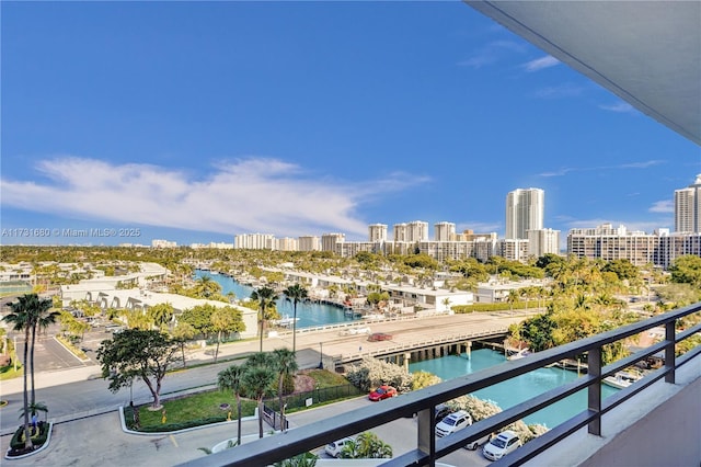 balcony featuring a water view