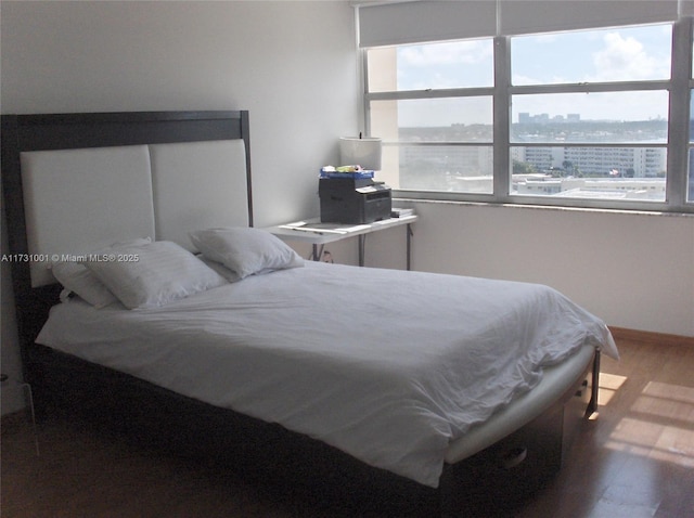 bedroom featuring hardwood / wood-style floors