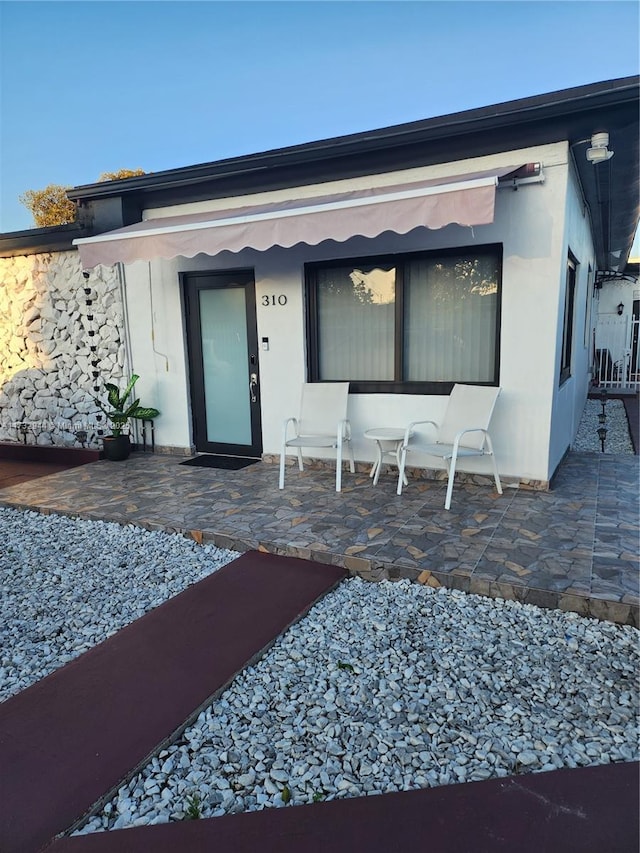 310-312 SW 36th Ave, Miami, FL 33135 - property entrance featuring a patio area