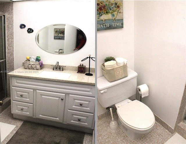 bathroom with vanity, tile patterned floors, and toilet