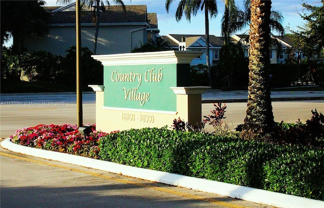 view of community sign