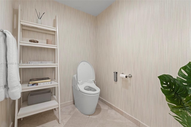 bathroom with tile patterned floors and toilet