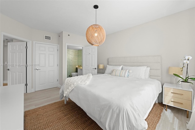 bedroom featuring wood-type flooring