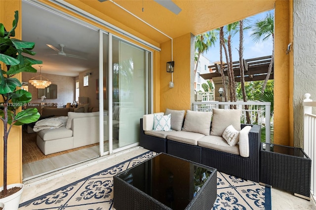 sunroom / solarium with plenty of natural light and ceiling fan with notable chandelier