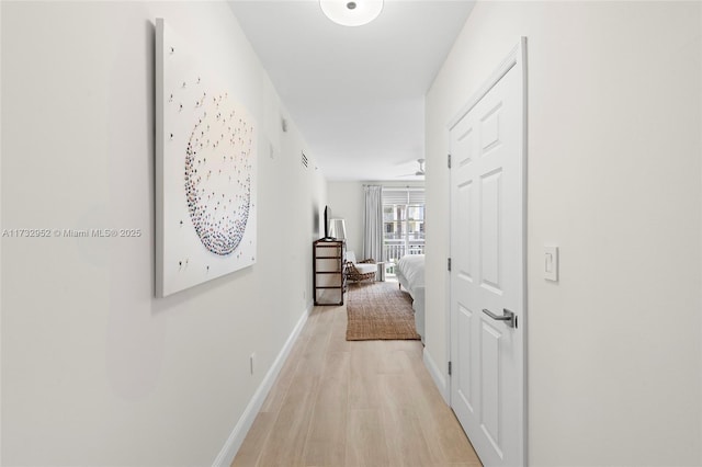 hallway featuring light wood-type flooring