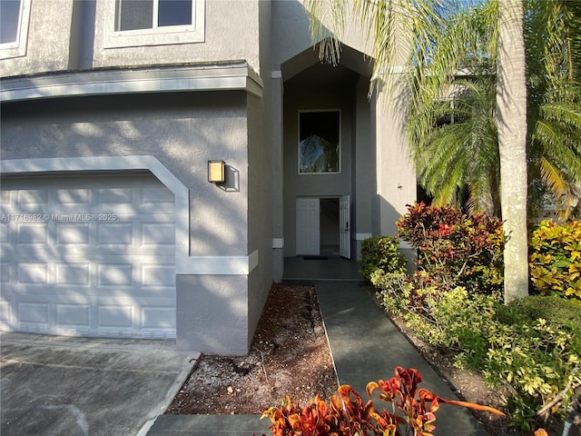 property entrance featuring a garage