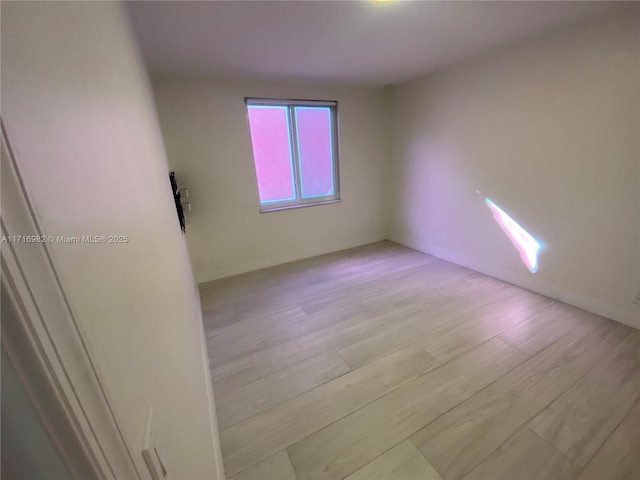 empty room featuring light hardwood / wood-style floors