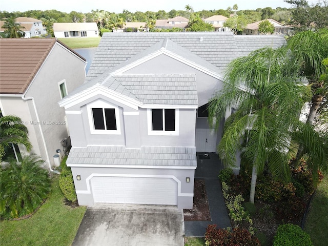 view of front of home with a garage