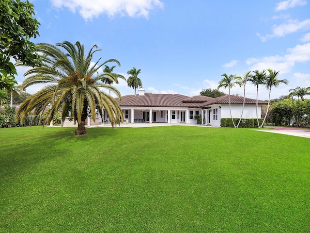 view of front of home with a front yard