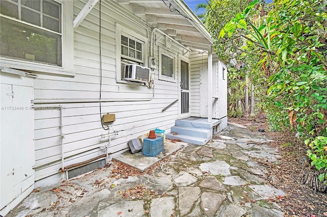 view of side of property with cooling unit