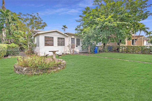 view of front facade with a front yard