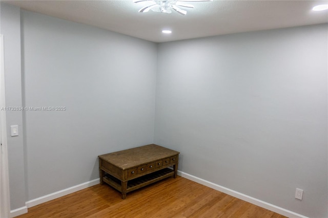 unfurnished room featuring hardwood / wood-style flooring