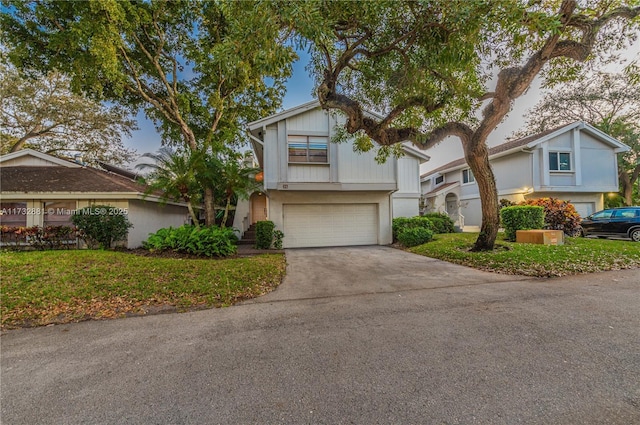 view of front of house with an attached garage and driveway