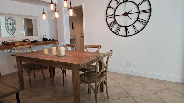 dining room featuring light tile patterned flooring