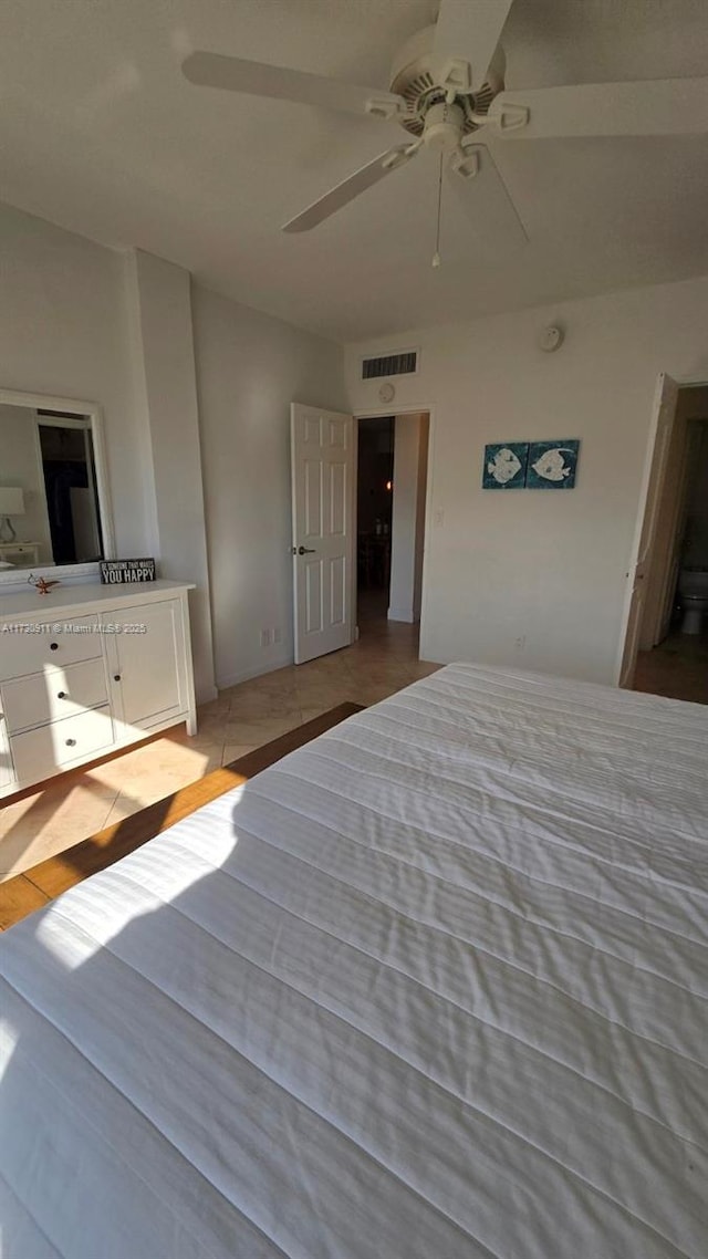 unfurnished bedroom featuring ceiling fan